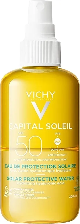 Vichy Capital Soleil Solar Protective Water Dvofazni hidratantni sprej za lice i telo na vodenoj bazi sa hijaluronskom kiselinom za zaštitu od sunca, SPF50